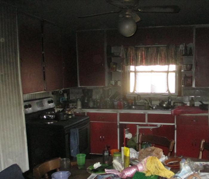 Kitchen fire damage before restoration
