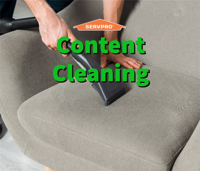 A couch undergoing deep content cleaning