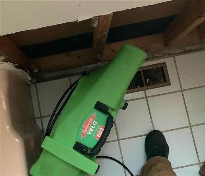 SERVPRO fan drying removed drywall after water damage 